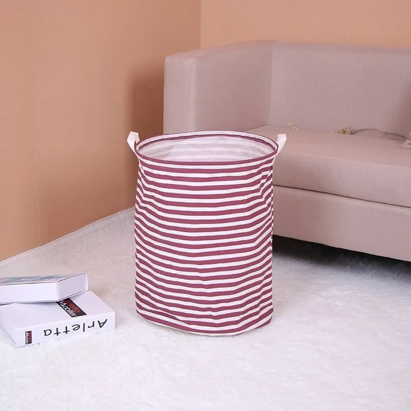 Striped cotton and linen storage basket, 40 x 50cm, with double handles, shown in black or red for laundry, toys or household use.