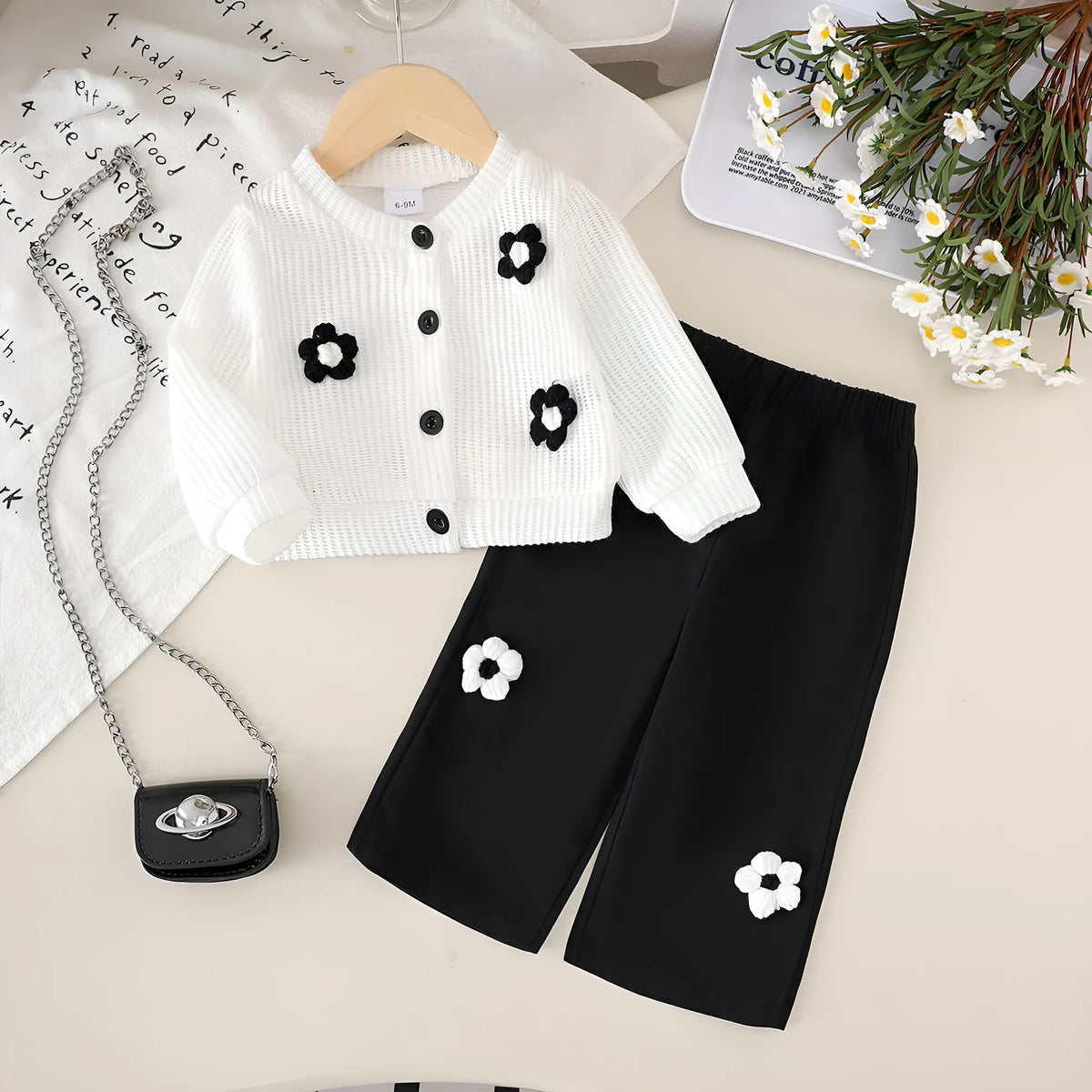 White floral long sleeve top and black trousers baby outfit set in cotton, sizes 6-9M to 2-3Y