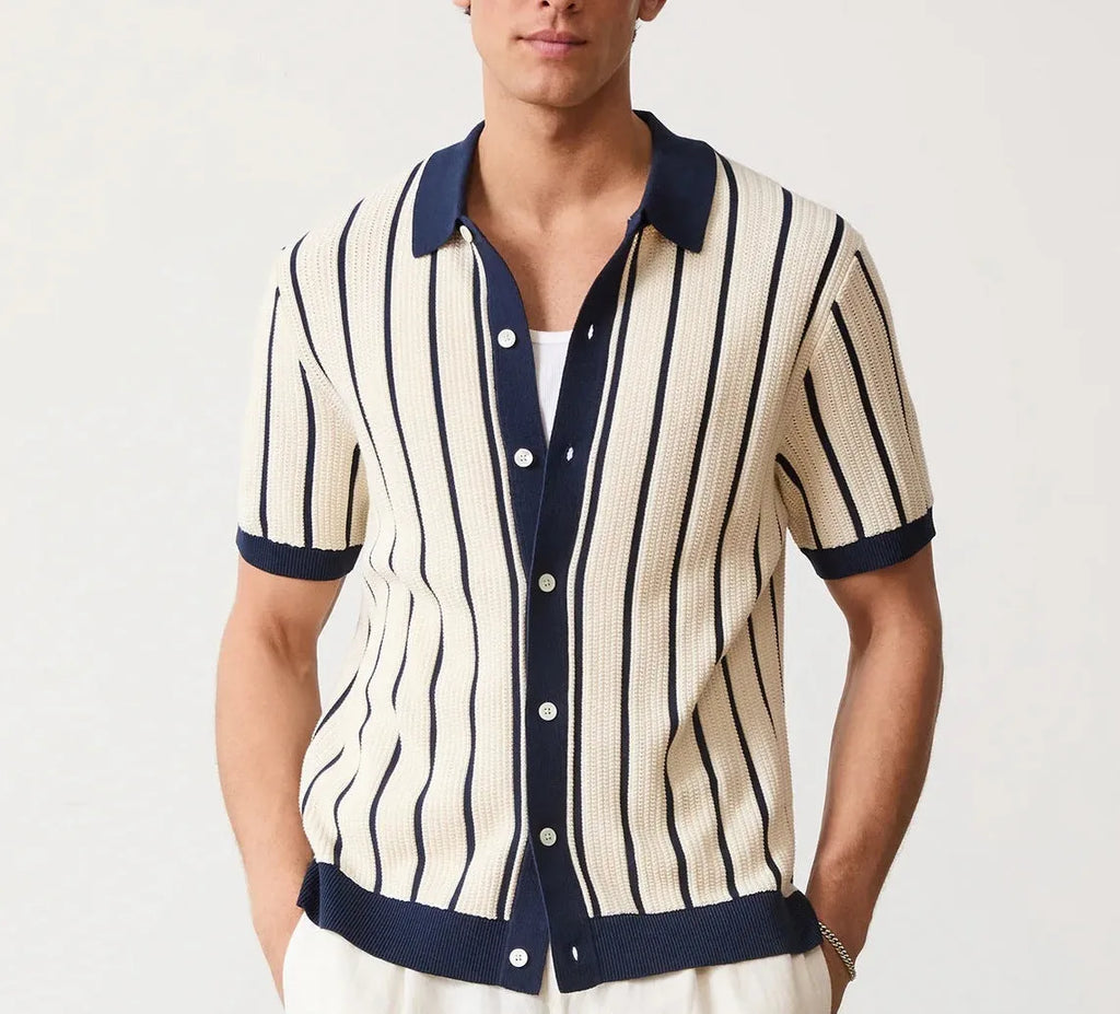 Men's white short sleeve knitted top with lapel collar and asymmetric design.