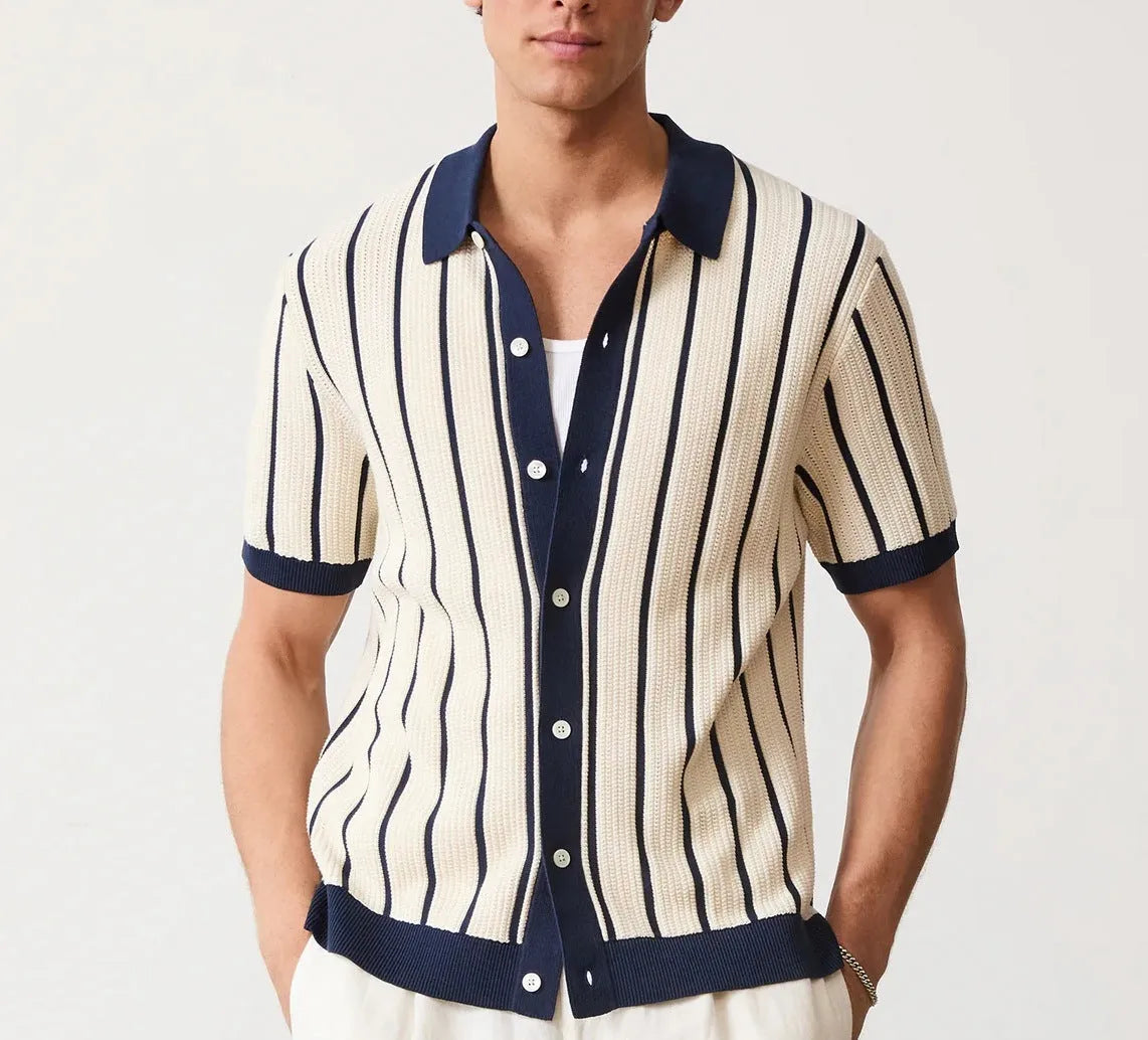 Men's white short sleeve knitted top with lapel collar and asymmetric design.
