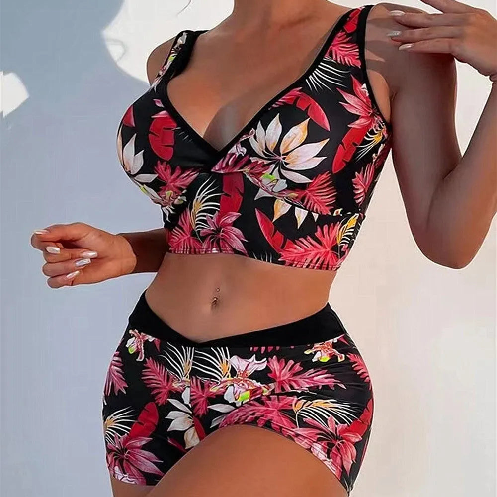 Women's two-piece swimsuit with printed boxer-style bikini bottoms in multi-colour patterns