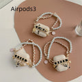 Off-white silicone AirPods case with pearl charm, five-piece set