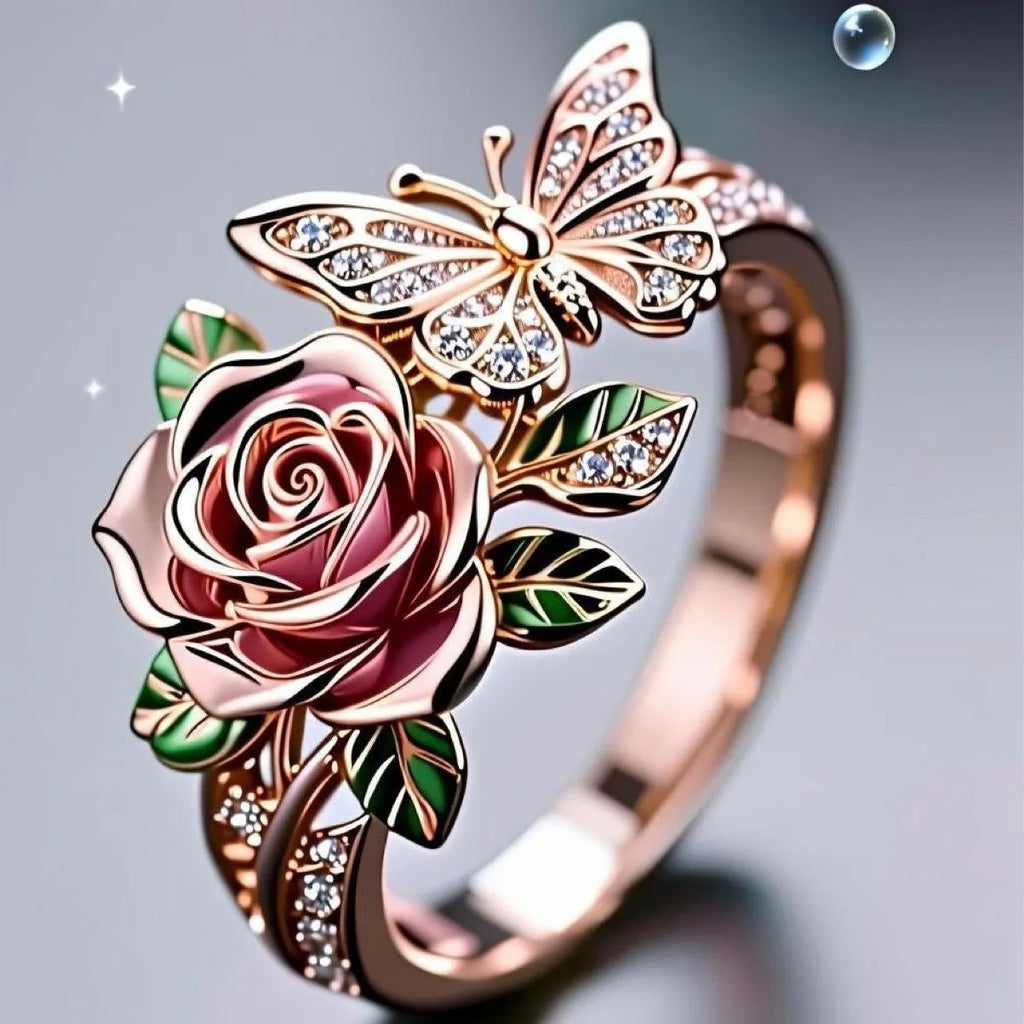 Colourful oil drip finish fairy style alloy ring with butterfly and floral motifs on an adjustable band.