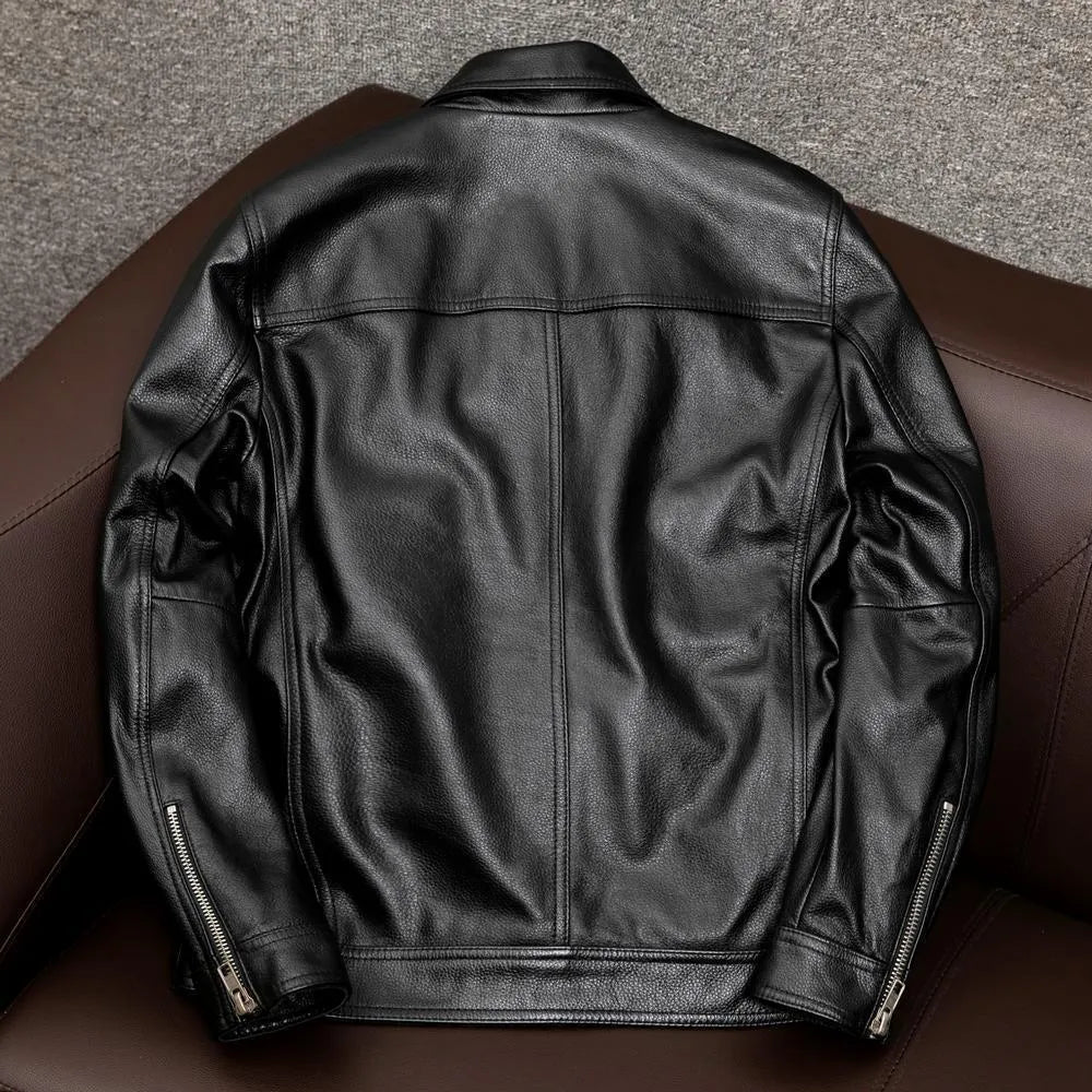 A loose-fit men's black PU leather lapel jacket with a side pocket, shown on a model.