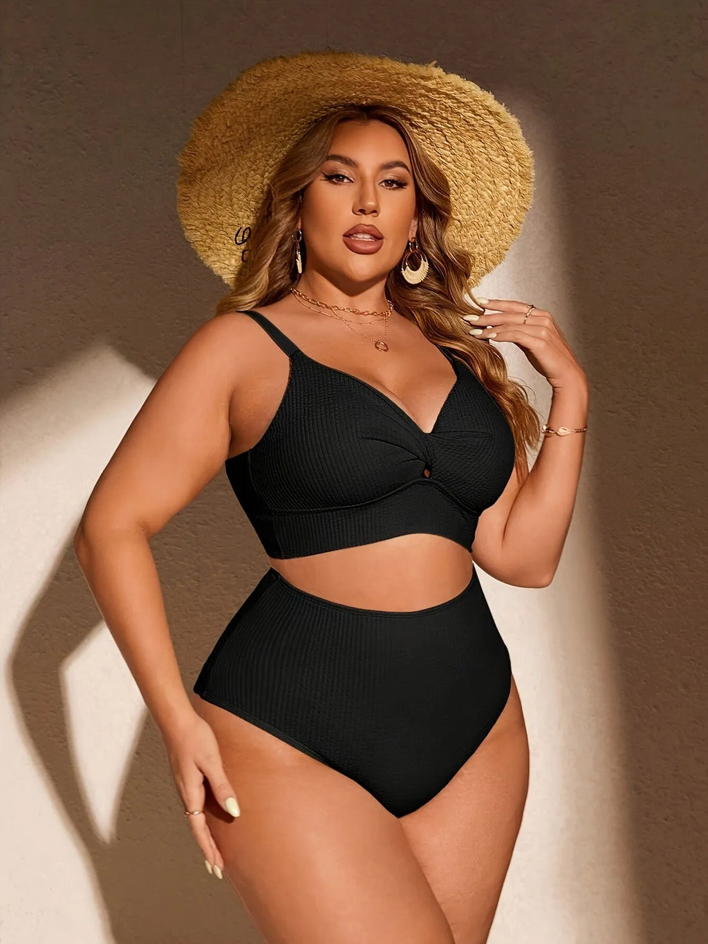 Women's black two-piece bikini set in polypropylene fibre, sizes 1XL to 4XL, with brief-style shorts