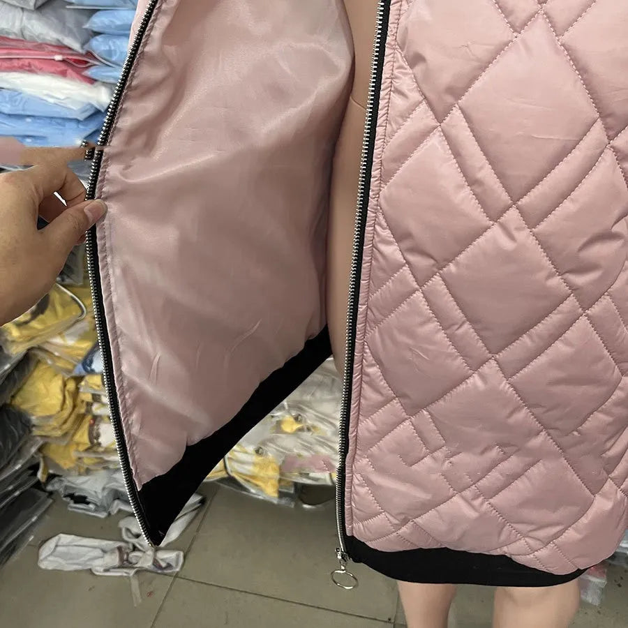 Women's pink cotton-blend hooded coat with long sleeves on a hanger