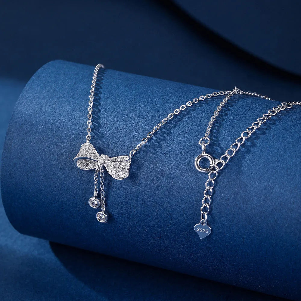 S925 sterling silver bow pendant necklace on O-ring chain, silver colour