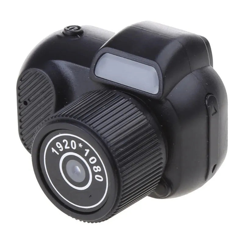 Black retro-style mini digital video camera with a built-in LCD screen on the back.