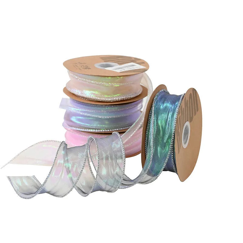 Roll of 4cm wide fishtail yarn ribbon with colourful wave pattern in multiple illusion colour options.