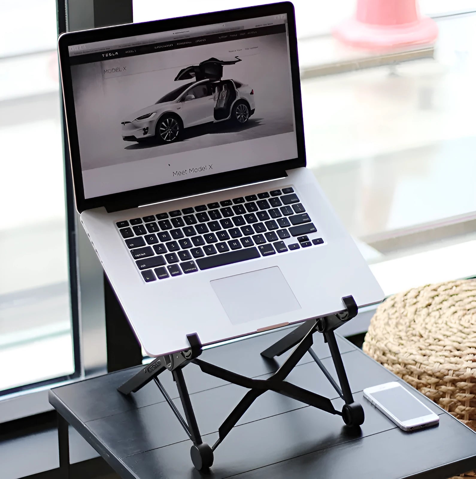 Black folding portable laptop stand with reinforced nylon construction showing 35.4cm width dimensions