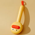 Small yellow duck-shaped pet grooming comb with open section design and needle teeth for cat and dog fur removal