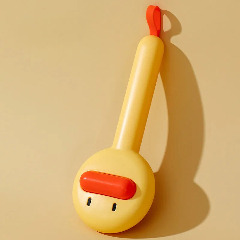 Small yellow duck-shaped pet grooming comb with open section design and needle teeth for cat and dog fur removal
