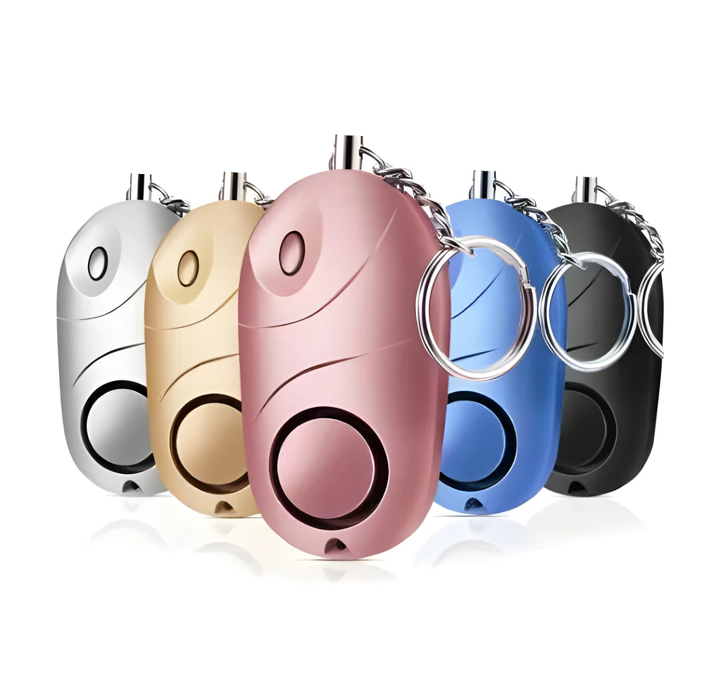 Personal alarm keychain with 130dB sound and LED flashlight in pink colour