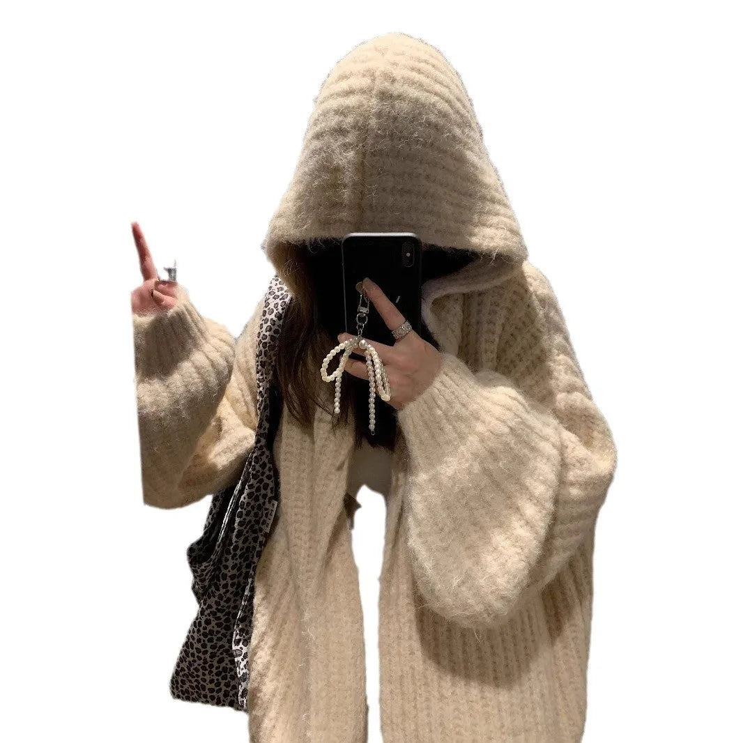 Woman wearing a dark grey retro knit Maillard pattern hooded cardigan