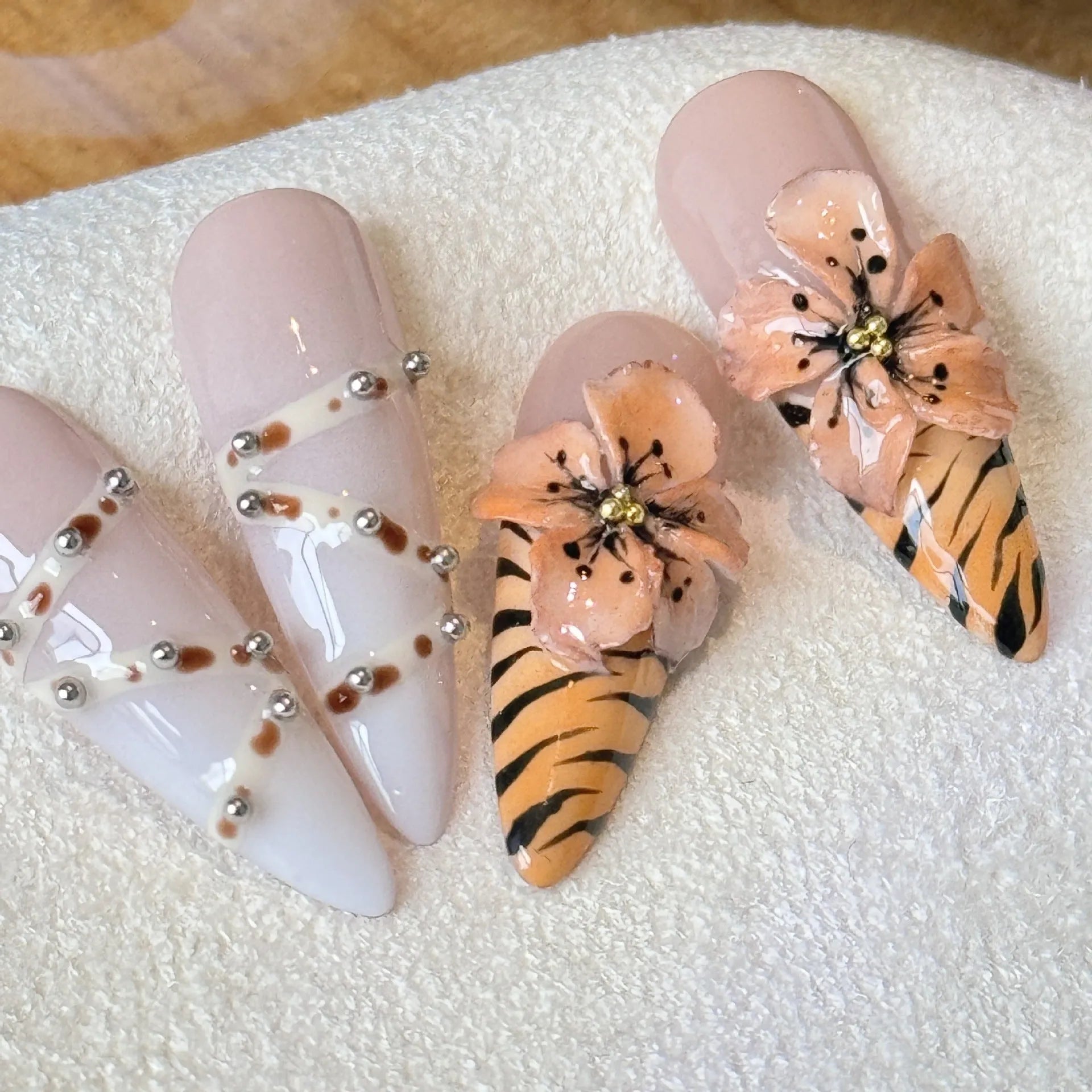Handmade leopard print, cross and flower pattern acrylic nail stickers in XS, S, M, L sizes.