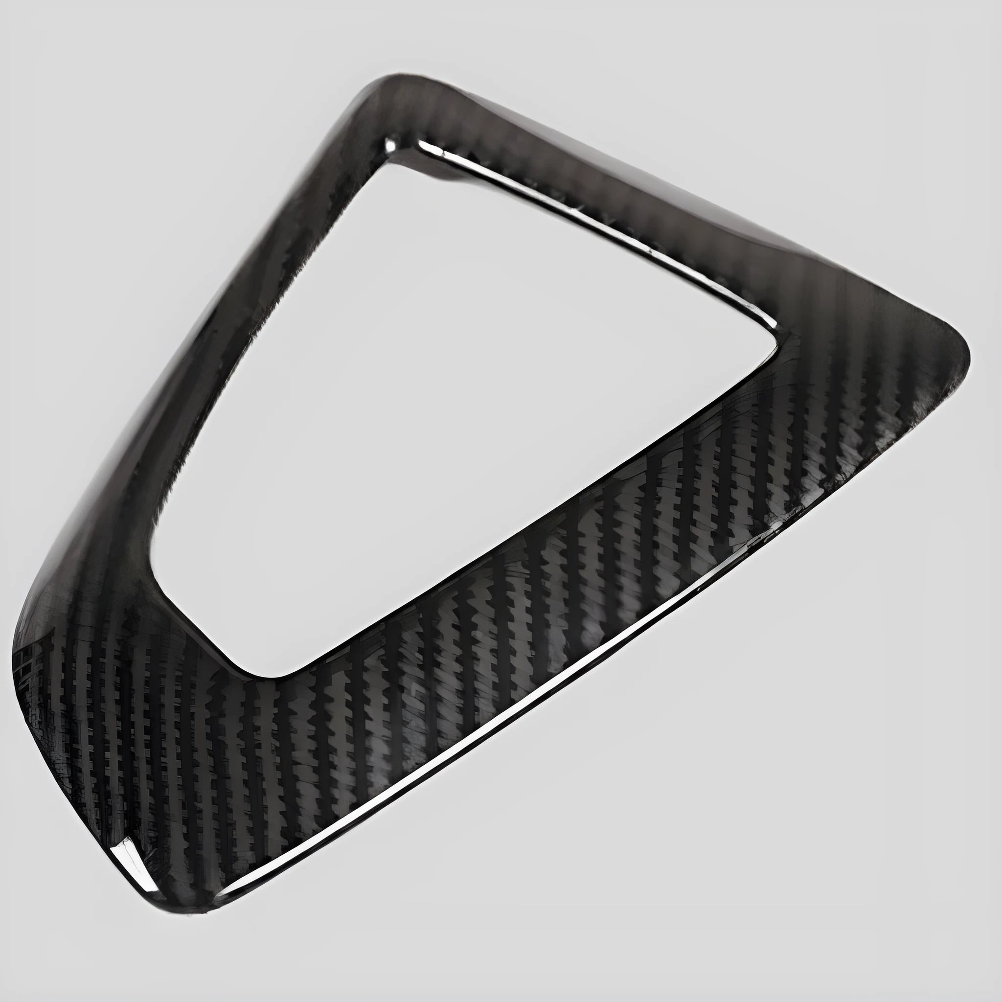 BMW carbon fibre pattern gear base frame panel measuring 13cm by 9cm