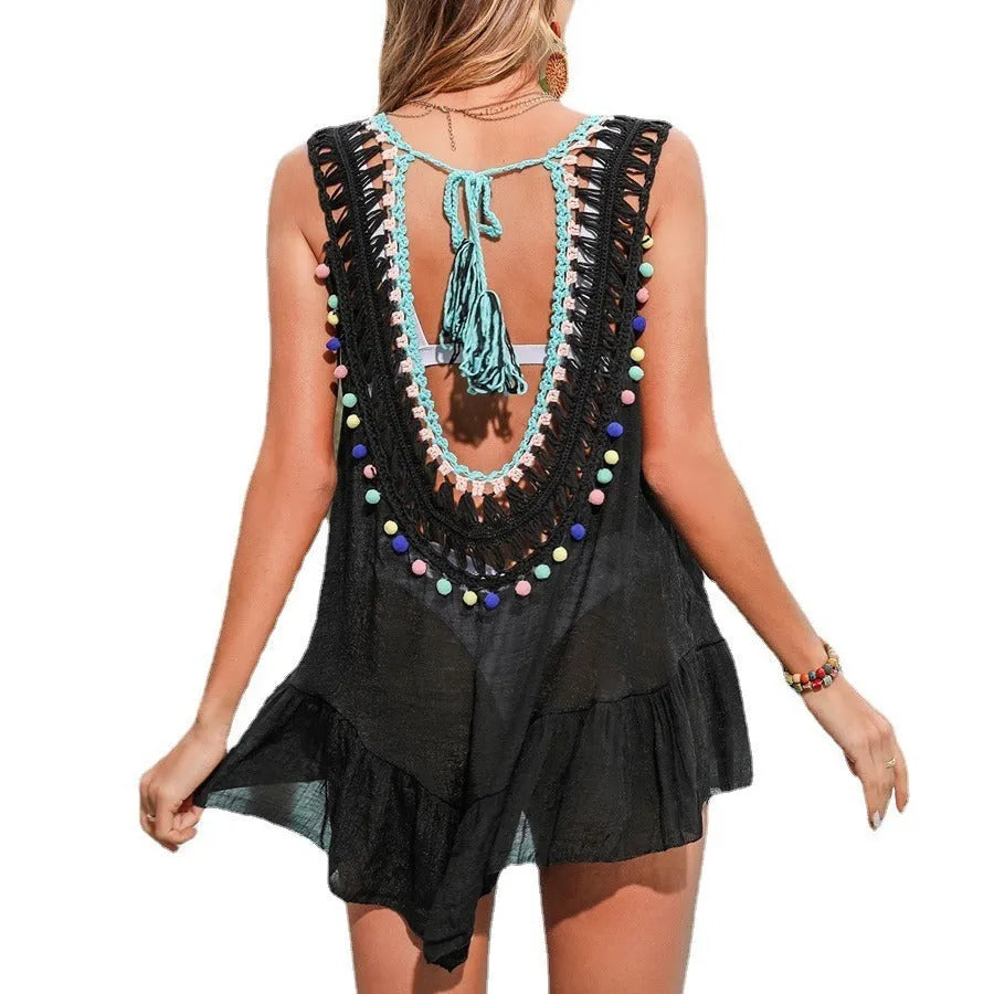Black hand crocheted beach cover-up vest with cut-out ruffled design and polyester lining