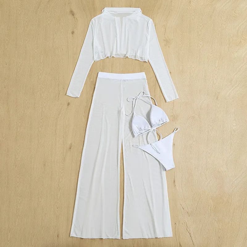 White women's swimwear four-piece set with high-waisted bottoms and backless top on a mannequin
