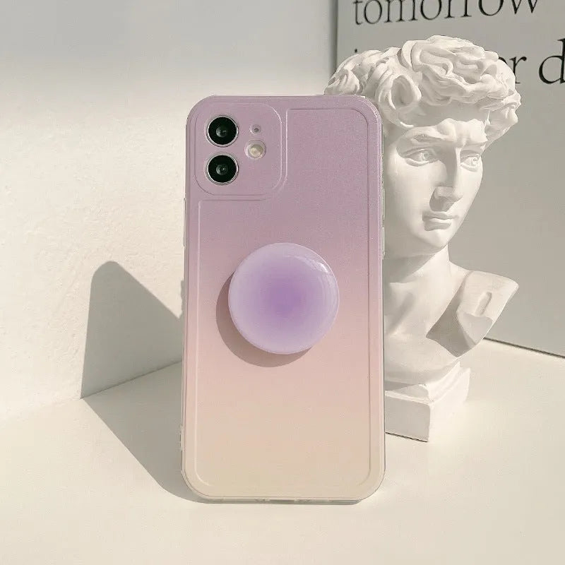 Yellow to purple gradient silicone protective case for iPhone on a table