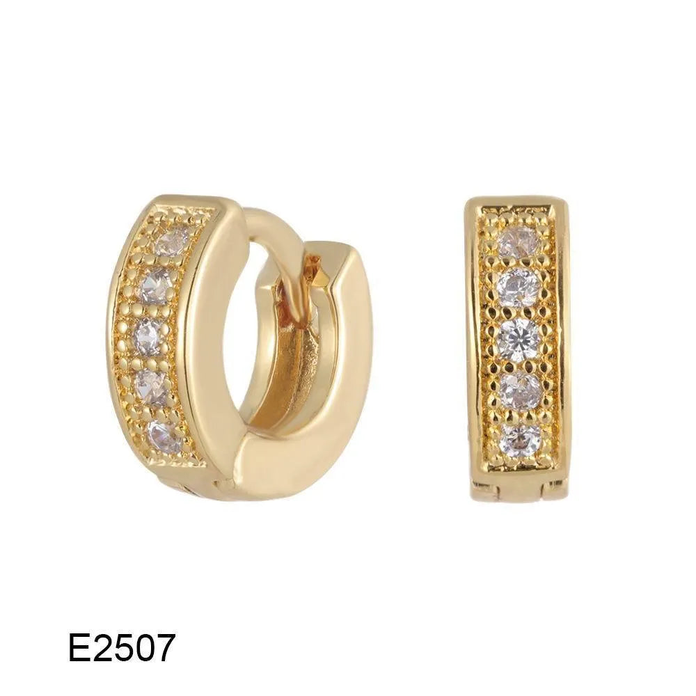 Brass gold plated heart shape clip-on earrings with gang drill detailing on a copper base.