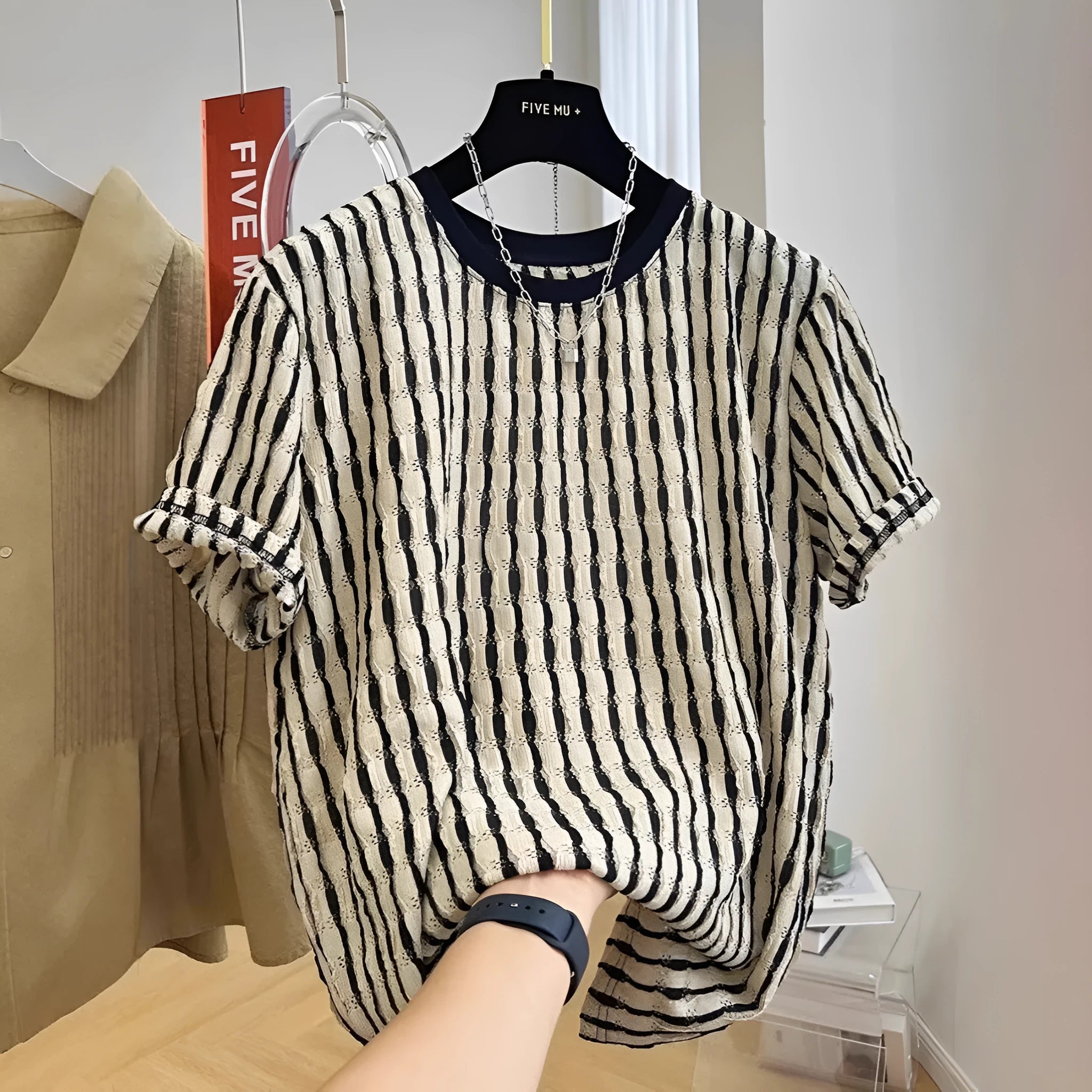 Black striped men's casual shirt with short sleeves and loose fit
