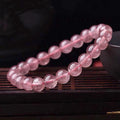Women's strawberry quartz crystal bracelet with polished beads in three size options