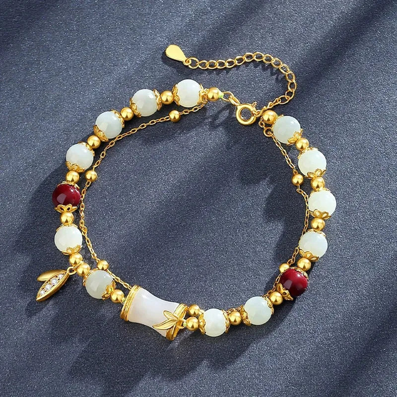 Retro glass flower bracelet with ruyi design in electroplated finish showing beige, green, light green, and white colour options