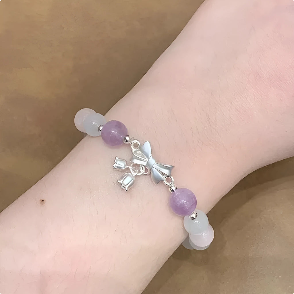 Lavender purple bowknot crystal bracelet with opal elements measuring 10mm