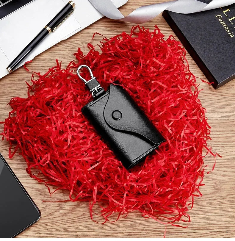 Square genuine leather keychain card holder with key ring in black colour.