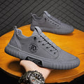 Men's casual slip on walking shoes in green with elastic entry, rubber sole, and car stitching detail