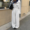 White striped loose wide-leg trousers with front zipper closure for commuting and workwear