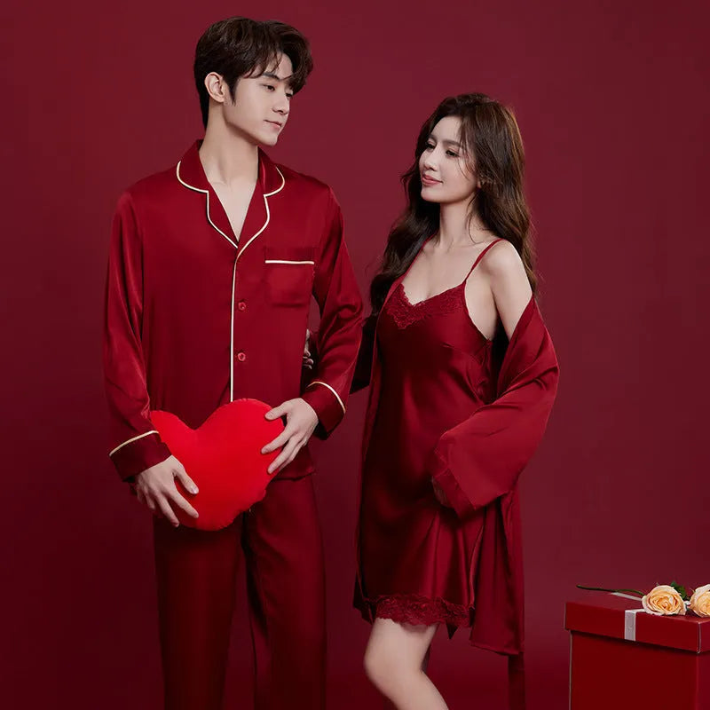 Red matching men's and women's ice silk sleepwear set with long sleeves and trousers.