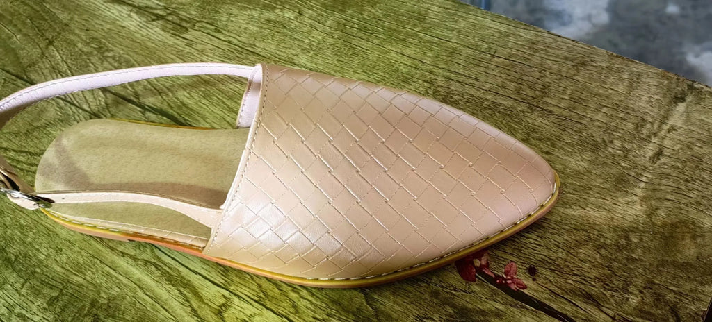 Baotou flat sandals with a buckle strap and pointed toe in multiple colour options.