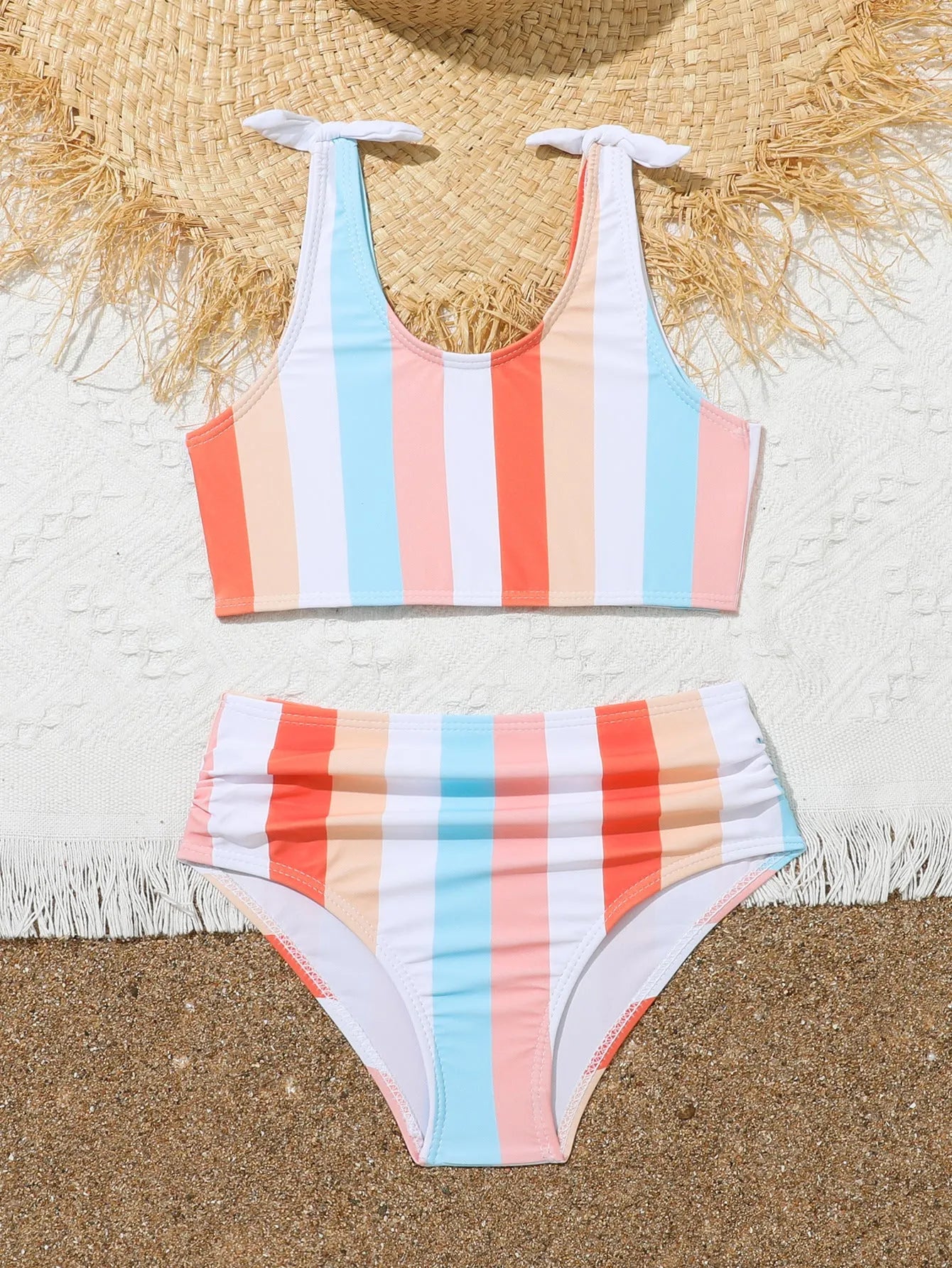 Girls' plaid print two-piece swimsuit set with bra top and briefs for swimming.