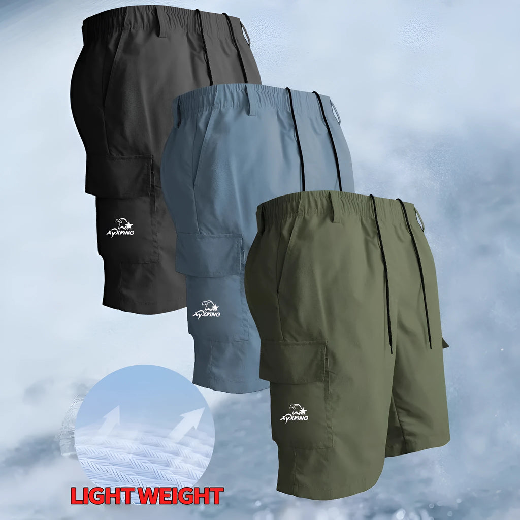 Loose straight casual sports shorts in polyester with micro elasticity, available in black, blue, green, and khaki colours