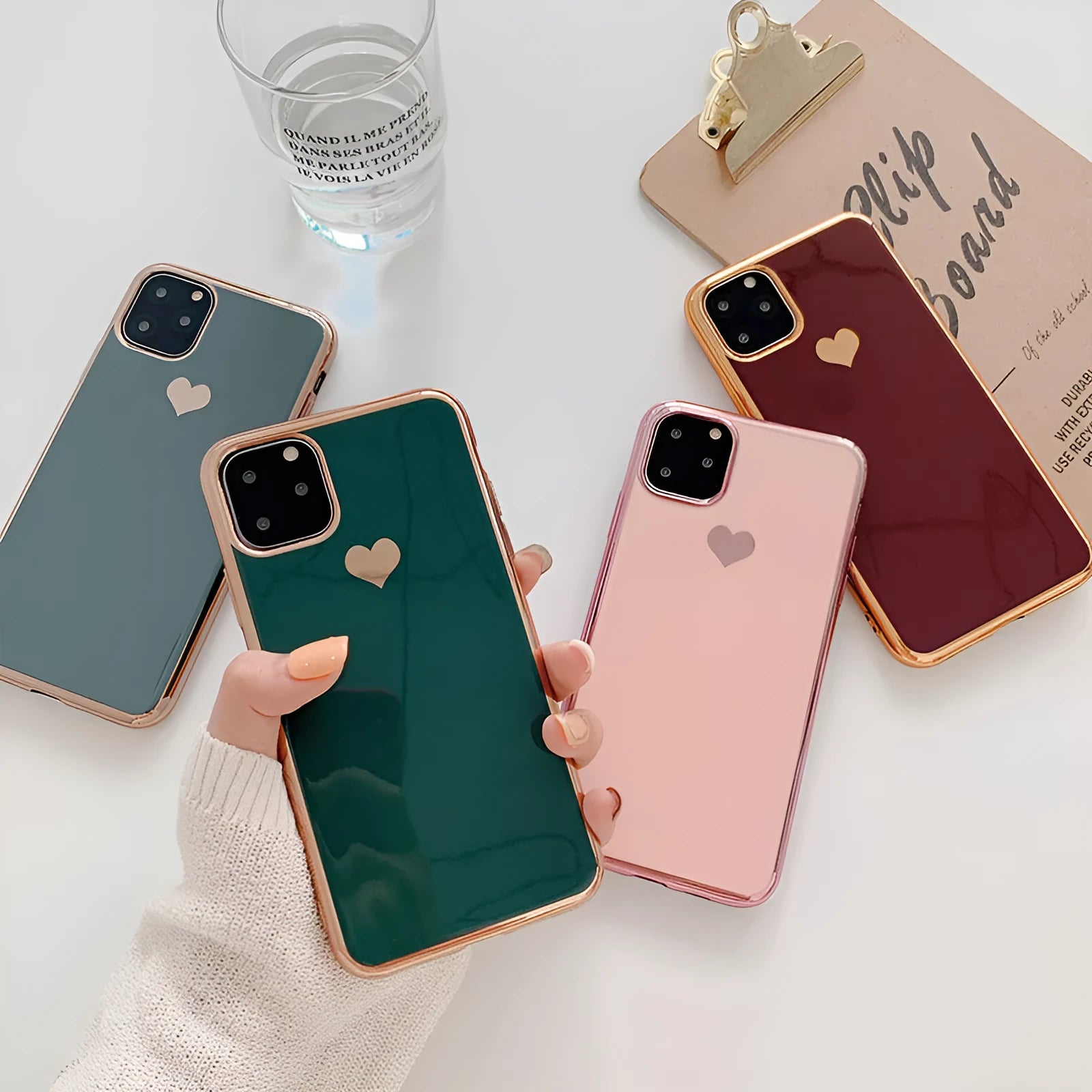 Solid colour TPU phone case for iPhone shown in blue, claret, pink and green options.
