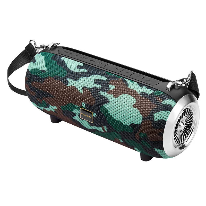 F666 square portable Bluetooth speaker with fabric mesh front, shoulder strap, and mobile phone on stand