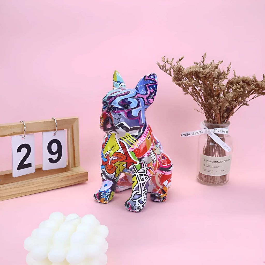 Modern graffiti-colour French bulldog resin statue on a shelf.