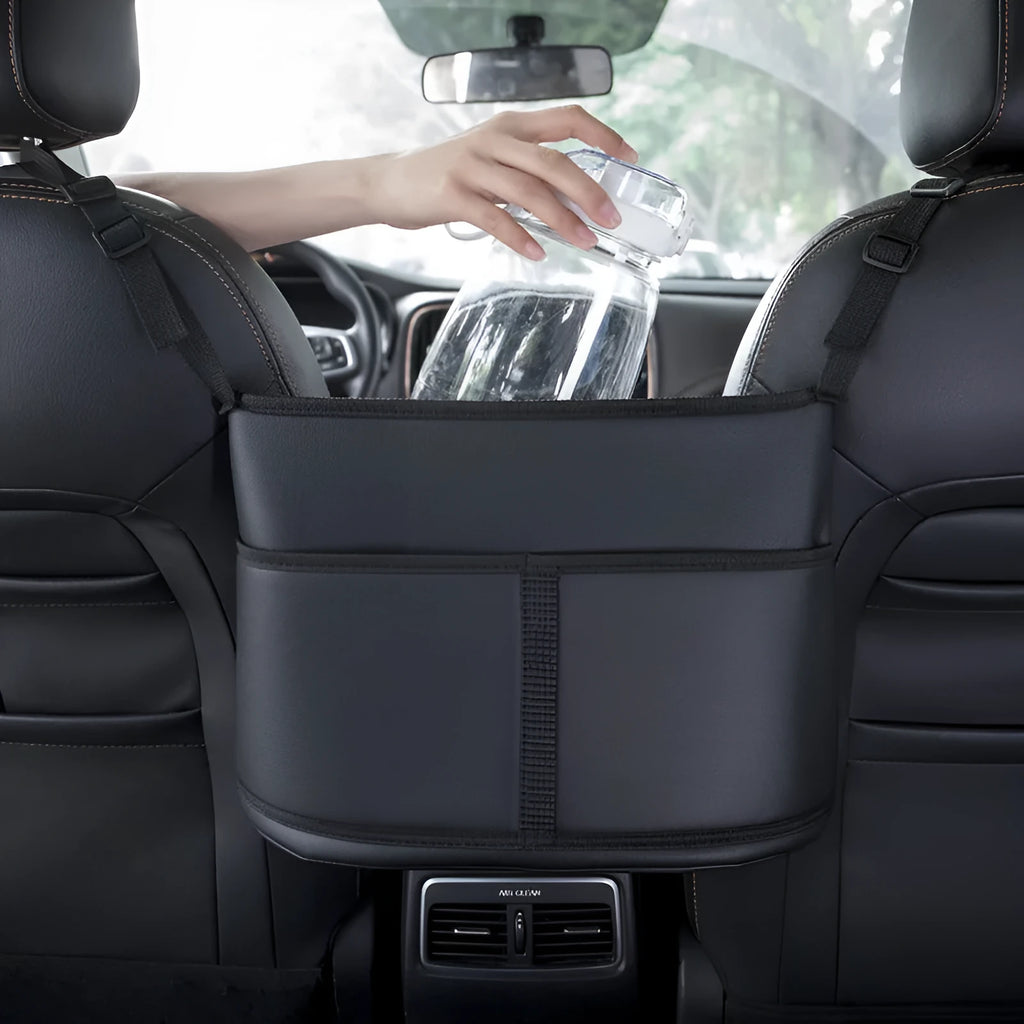 Black leather car seat net pocket storage bag with sports carbon fibre pattern.