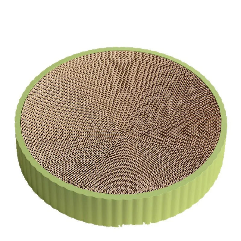Round green and white corrugated paper cat scratching board and bed, 55cm diameter.