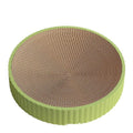 Round green and white corrugated paper cat scratching board and bed, 55cm diameter.