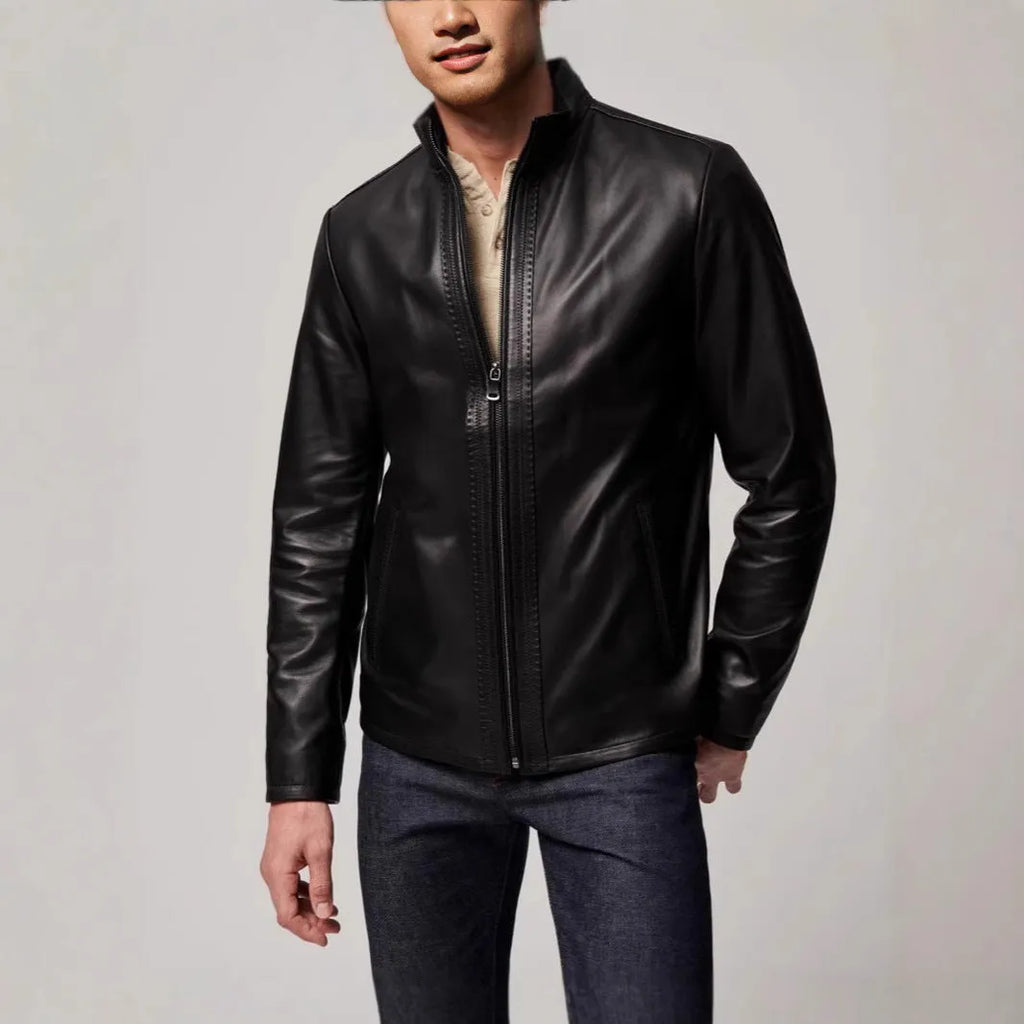 Man wearing a black retro-style leather-look jacket made from polyester fibre.