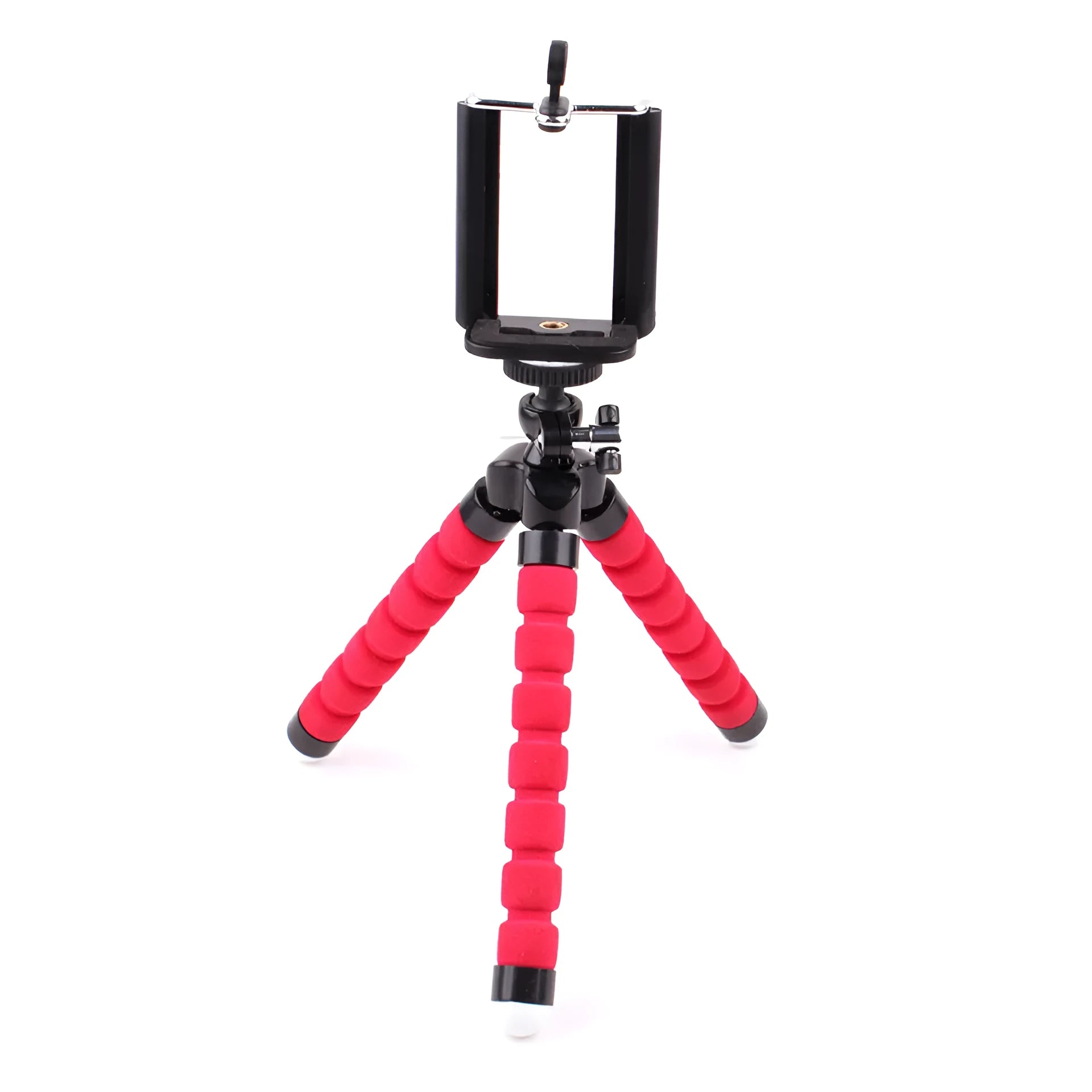Mini flexible black sponge octopus tripod stand holding a smartphone on a desk edge.