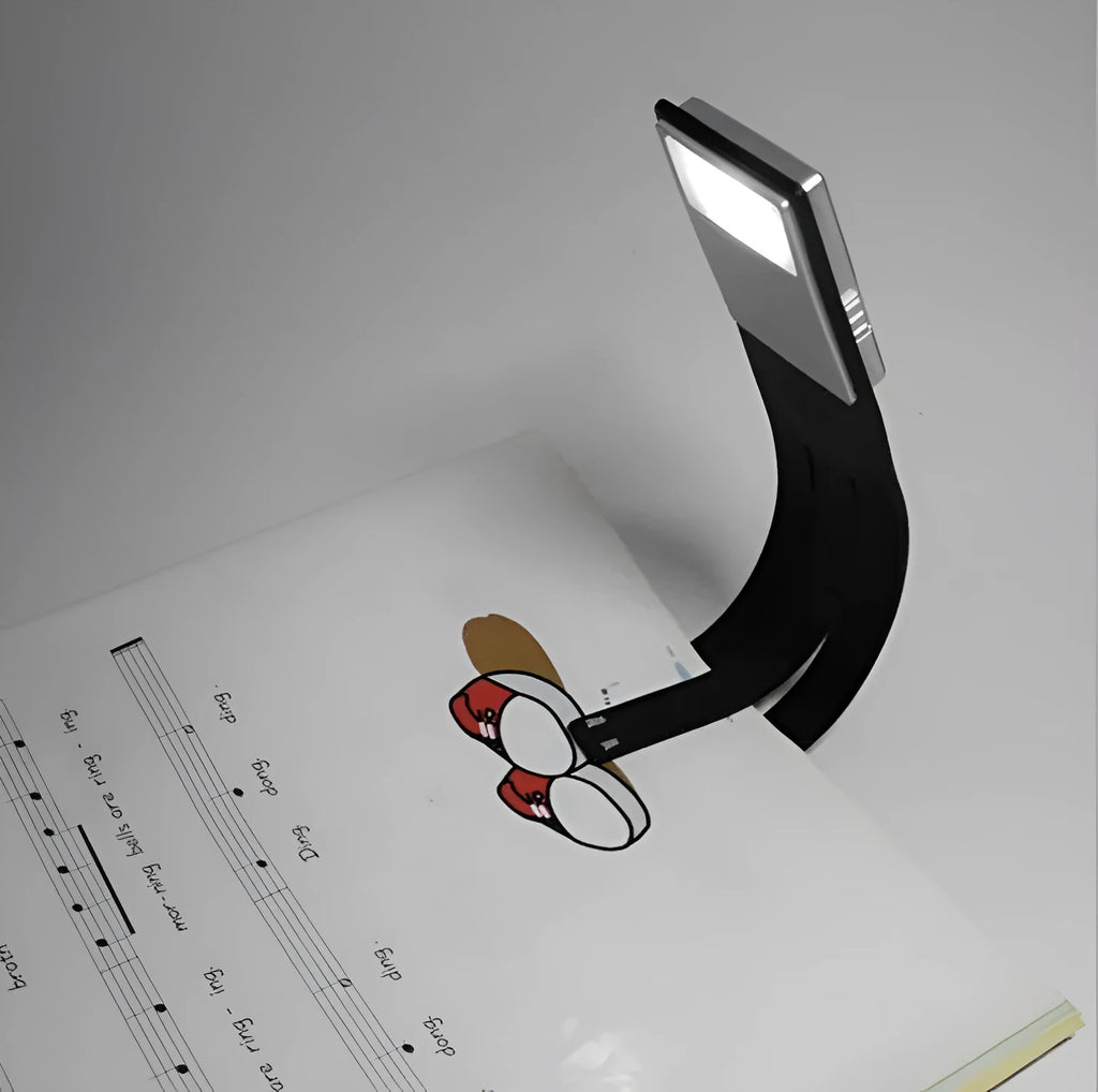 Black folding LED reading lamp with USB charging port and adjustable brightness settings