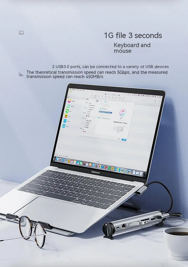 Aluminium alloy notebook docking station with multiple USB 3.0 ports and cable on desk