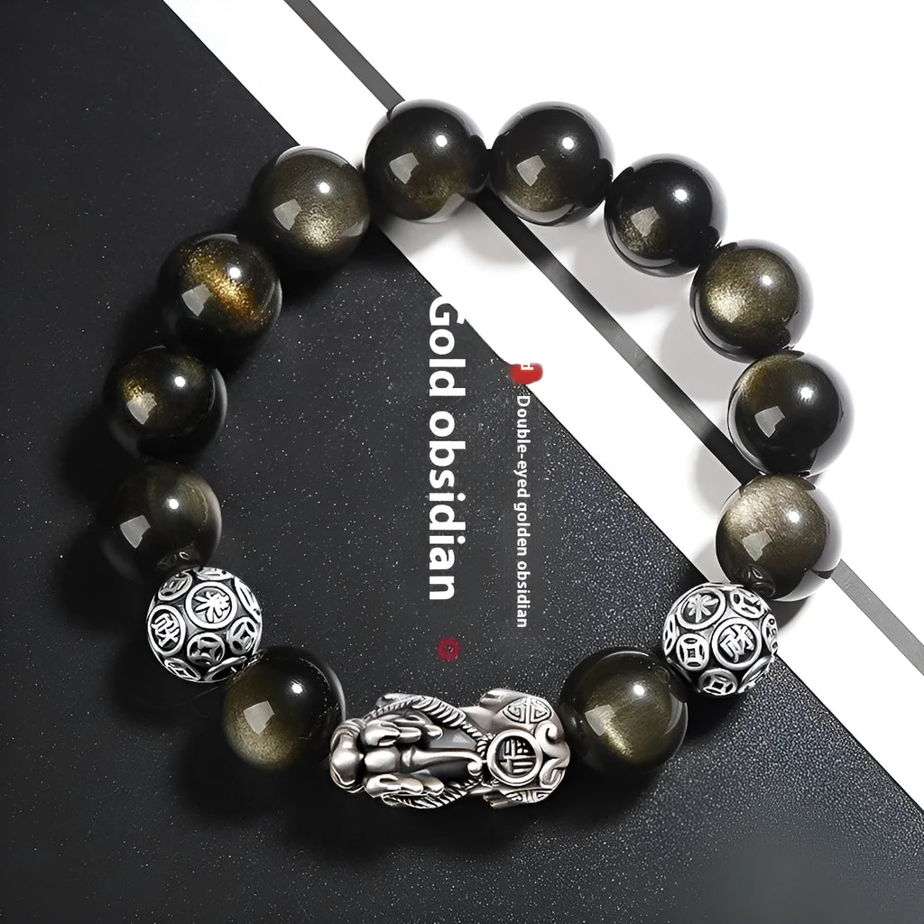 Men's sterling silver and obsidian bracelet with geometric design on a brown leather band.