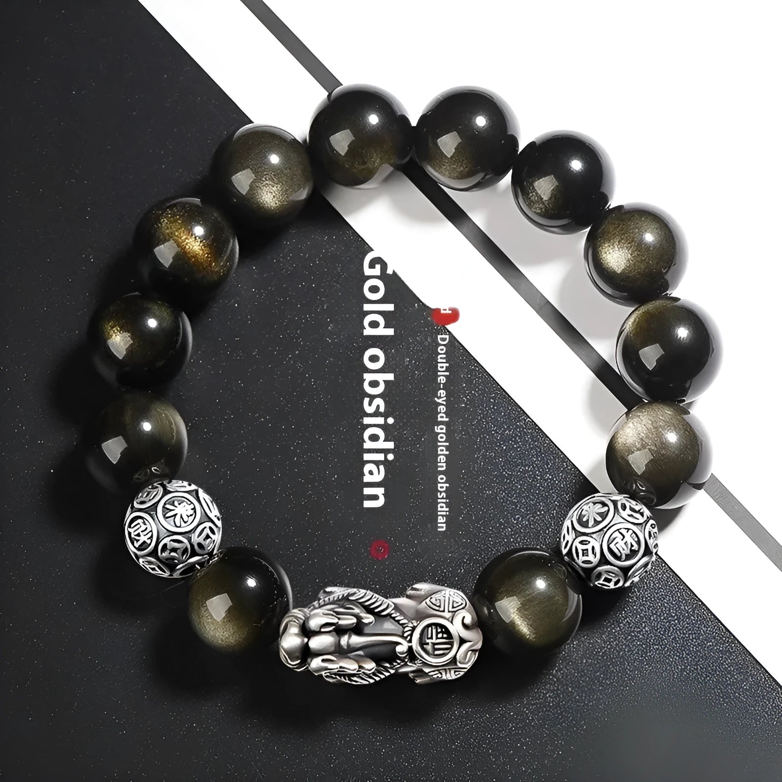 Men's sterling silver and obsidian bracelet with geometric design on a brown leather band.