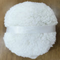 Oversized rectangular plush powder puff for makeup in white, pink, or skin colour on a 150x75mm size scale.