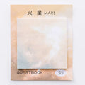 Square planet sticky notes pad showing celestial oil painting designs in six colour variations