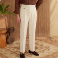 Men's slim fit straight leg trousers in dark grey, light brown, and light apricot colours.